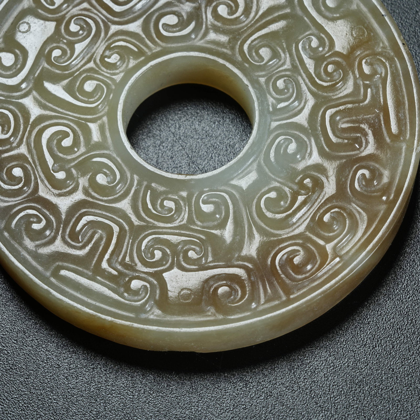 A ARCHAIC JADE BI DISC WITH HOOKED CLOUD PATTERNS - 4