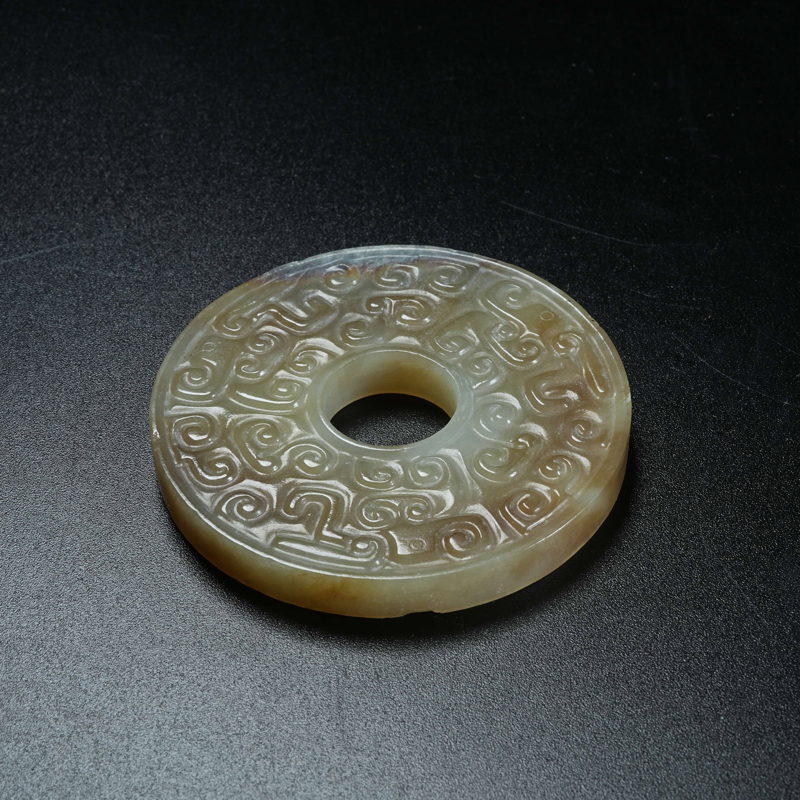 A ARCHAIC JADE BI DISC WITH HOOKED CLOUD PATTERNS - 5