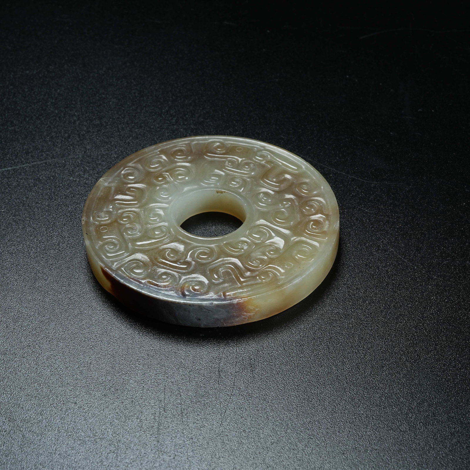 A ARCHAIC JADE BI DISC WITH HOOKED CLOUD PATTERNS - 7