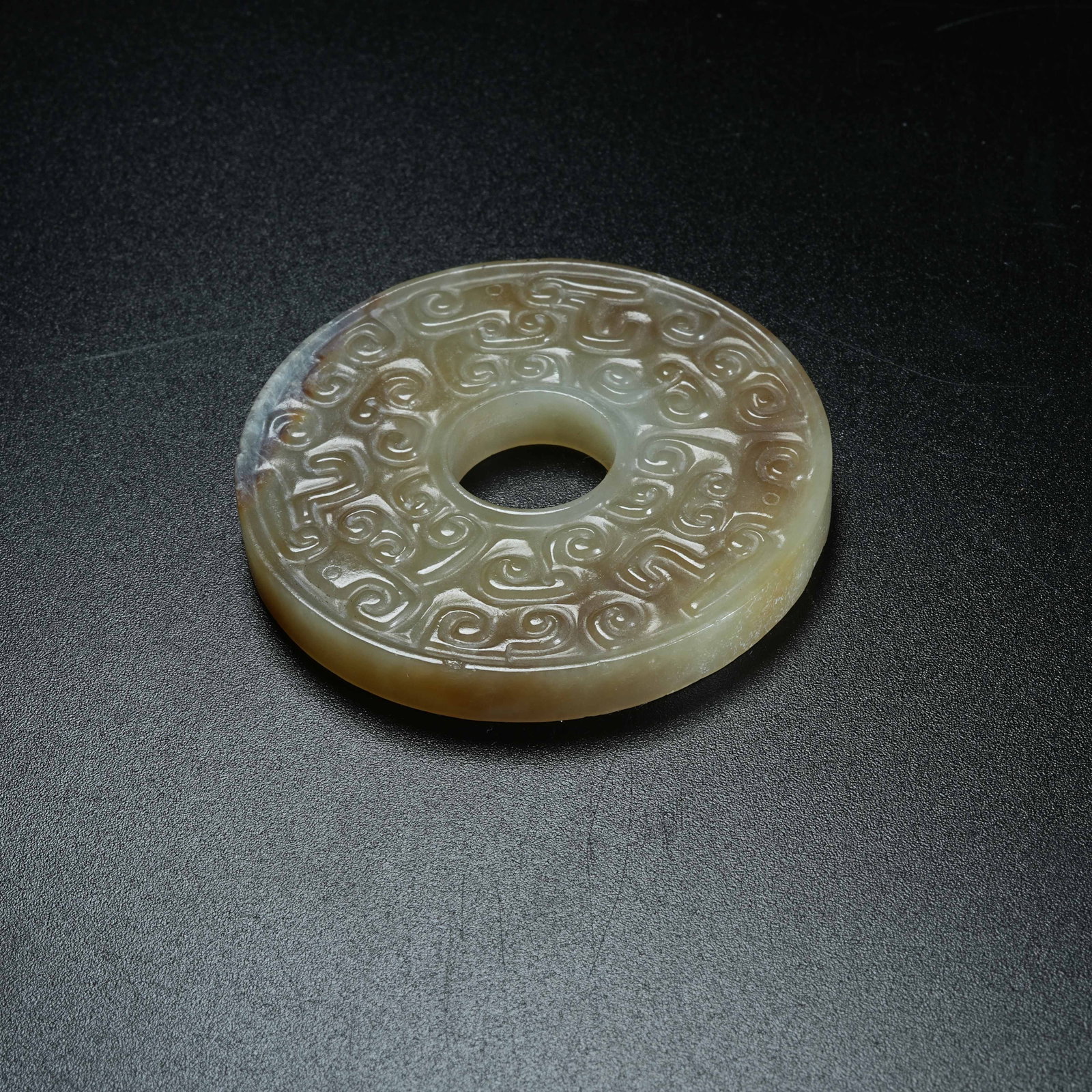 A ARCHAIC JADE BI DISC WITH HOOKED CLOUD PATTERNS - 8