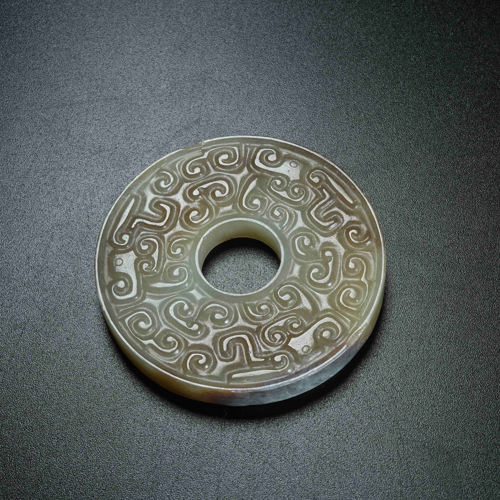 A ARCHAIC JADE BI DISC WITH HOOKED CLOUD PATTERNS - 9
