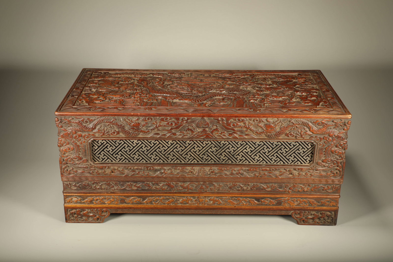 A HUANGHUALI WOOD BOX CARVED WITH DRAGON MOTIFS (1 of 7)