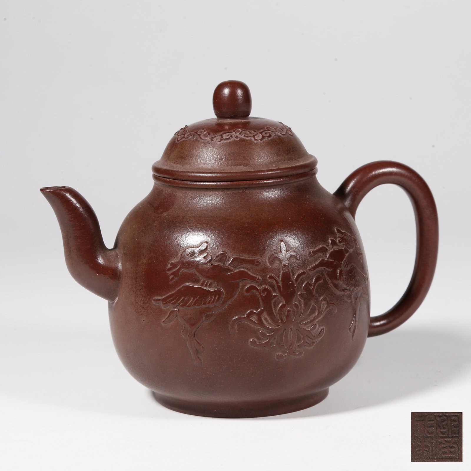 A ZISHA EWER CARVED WITH BEAST PATTERN: Zisha Ewer Carved with Beast Pattern