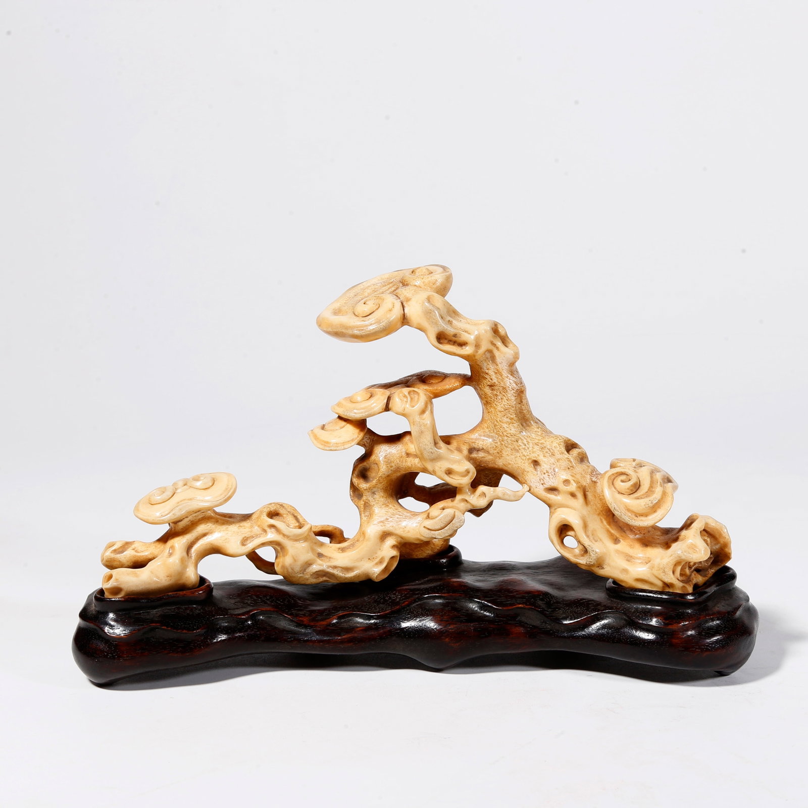 A BONE GANODERMA LUCIDUM SHAPED BRUSH REST: Bone Ganoderma Lucidum Shaped Brush Rest