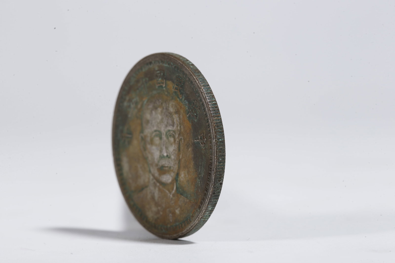 A SILVER DOLLAR COIN - 2