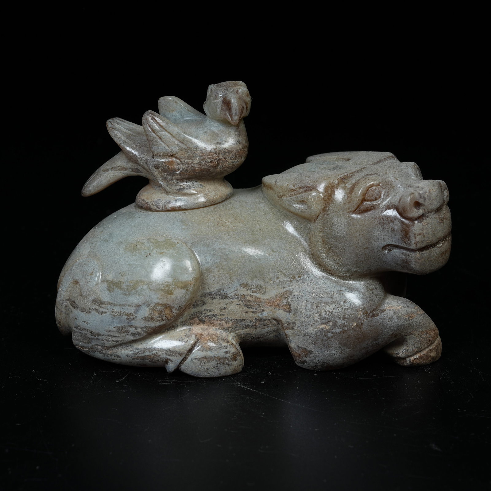 A ARCHAIC JADE LIDDED CENSER WITH RECUMBENT OX BODY AND PHOENIX KNOB: Archaic Jade Lidded Censer with Recumbent Ox Body and Phoenix Knob