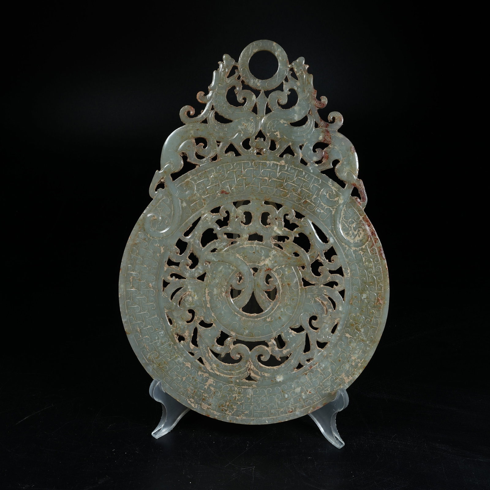 A ANCIENT JADE OPENWORK BI DISC CARVED WITH CHI DRAGON PATTERNS EXTENDING BEYOND RIM (1 of 8)