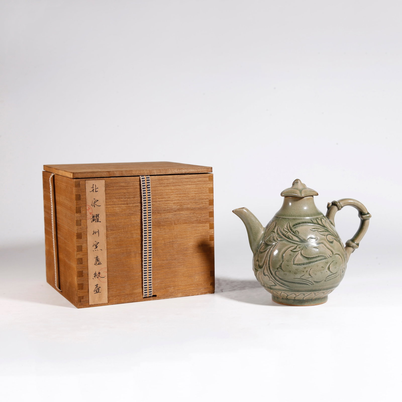 A YAOZHOU KILN EWER WITH DEER PATTERN: Yaozhou Kiln Ewer with Deer Pattern