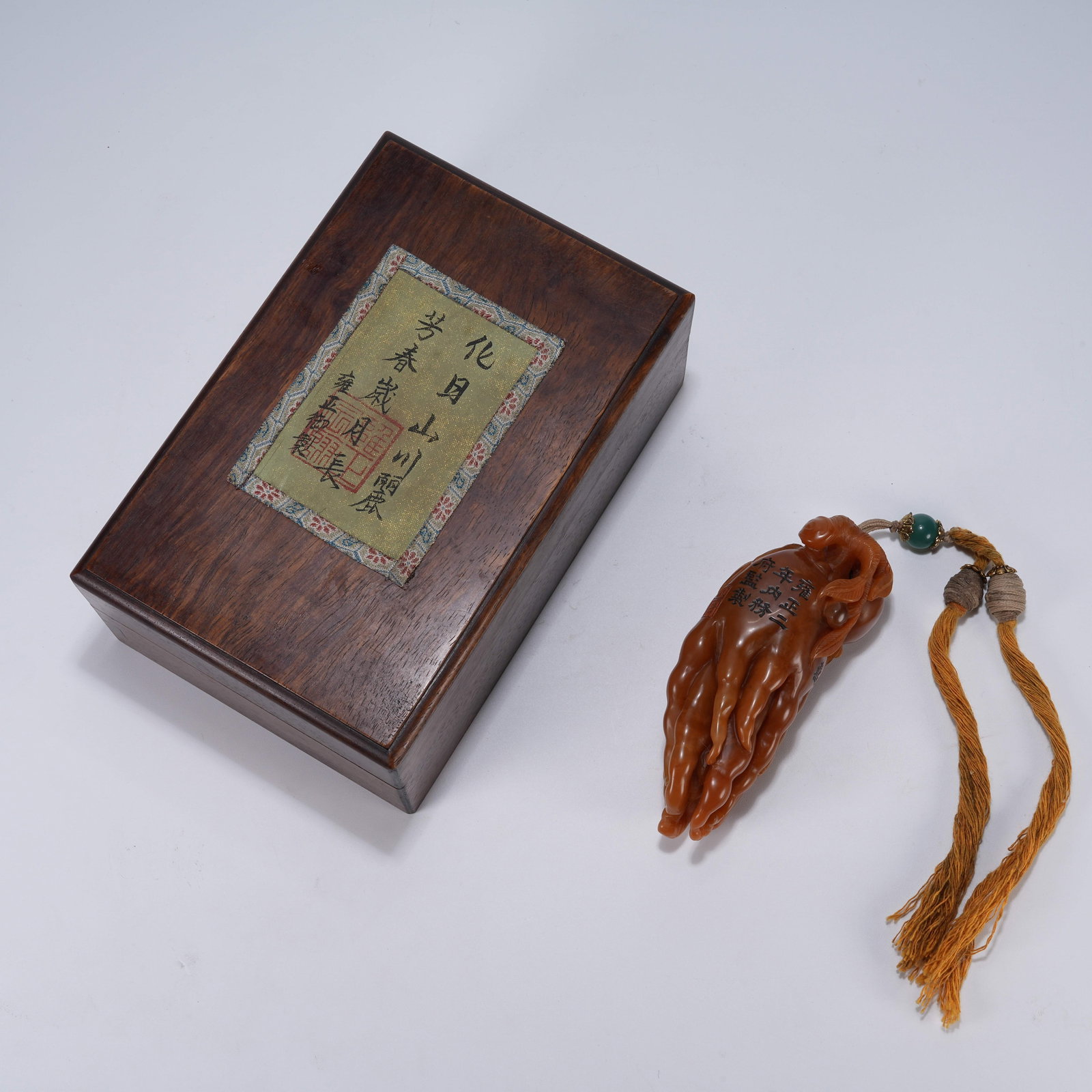 A SHOUSHAN STONE HAND PIECE SYMBOLIZING BLESSINGS AND LONGEVITY: Shoushan Stone Hand Piece Symbolizing Blessings and Longevity