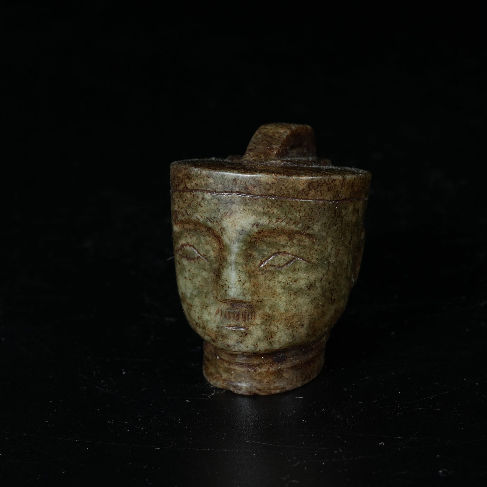 A ARCHAIC JADE FIGURINE HEAD PENDANT: Archaic Jade Figurine Head Pendant