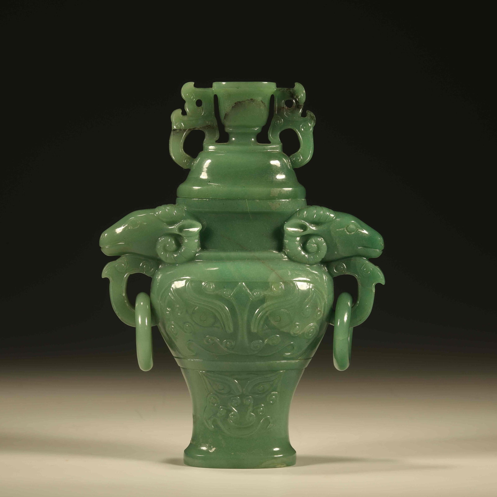 A AVENTURINE STONE COVERED VASE WITH BEAST MASK AND SHEEP EARS: Aventurine Stone Covered Vase with Beast Mask and Sheep Ears