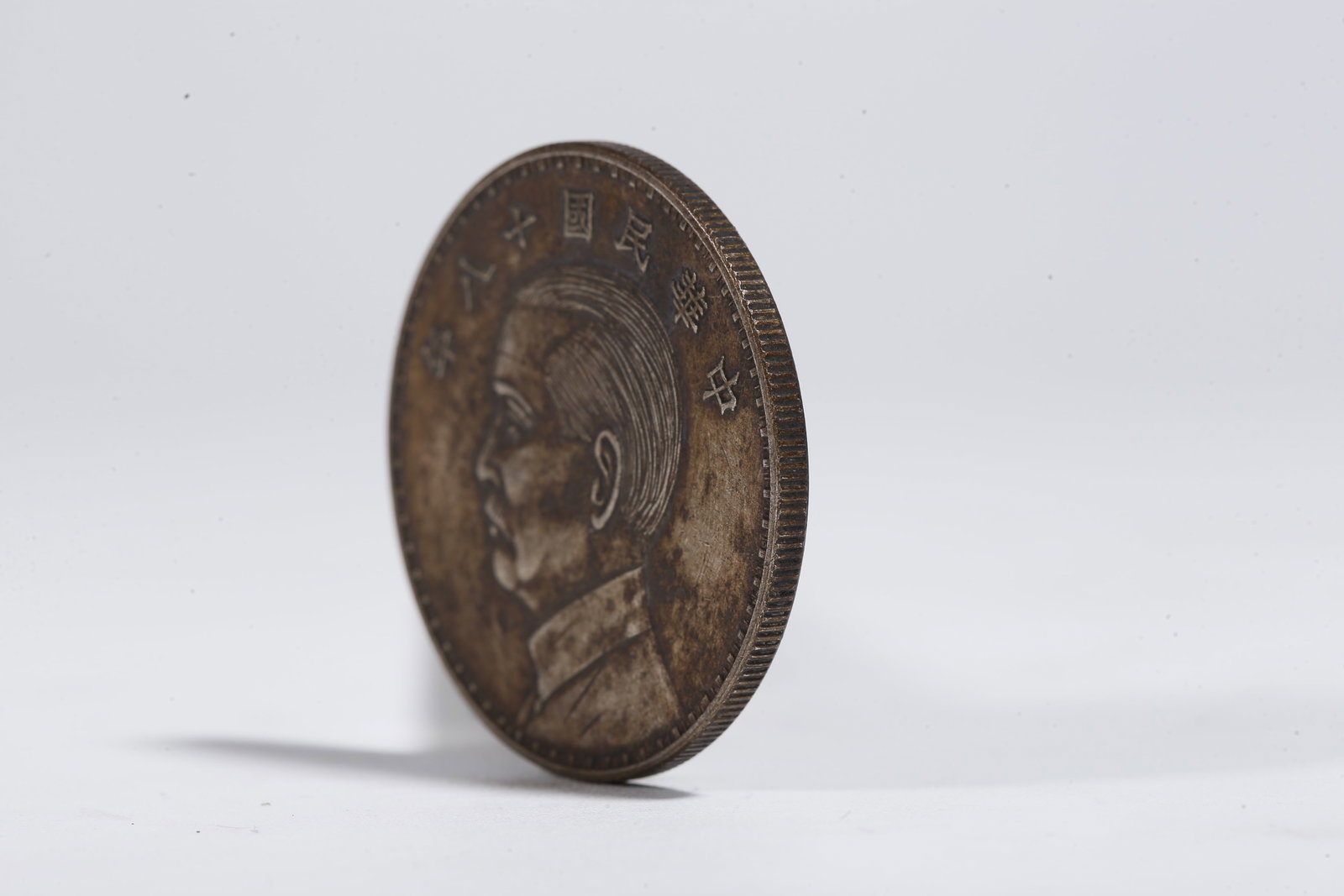 A SILVER DOLLAR COIN - 2
