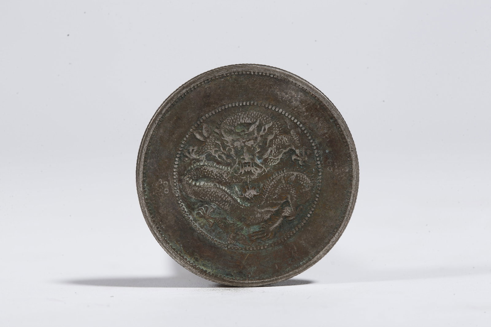 A SILVER DOLLAR COIN - 3