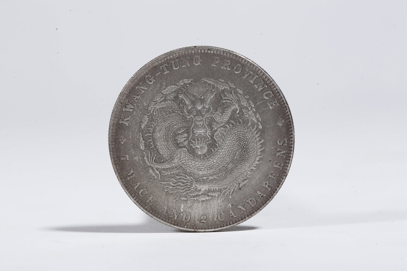 A SILVER DOLLAR COIN - 3
