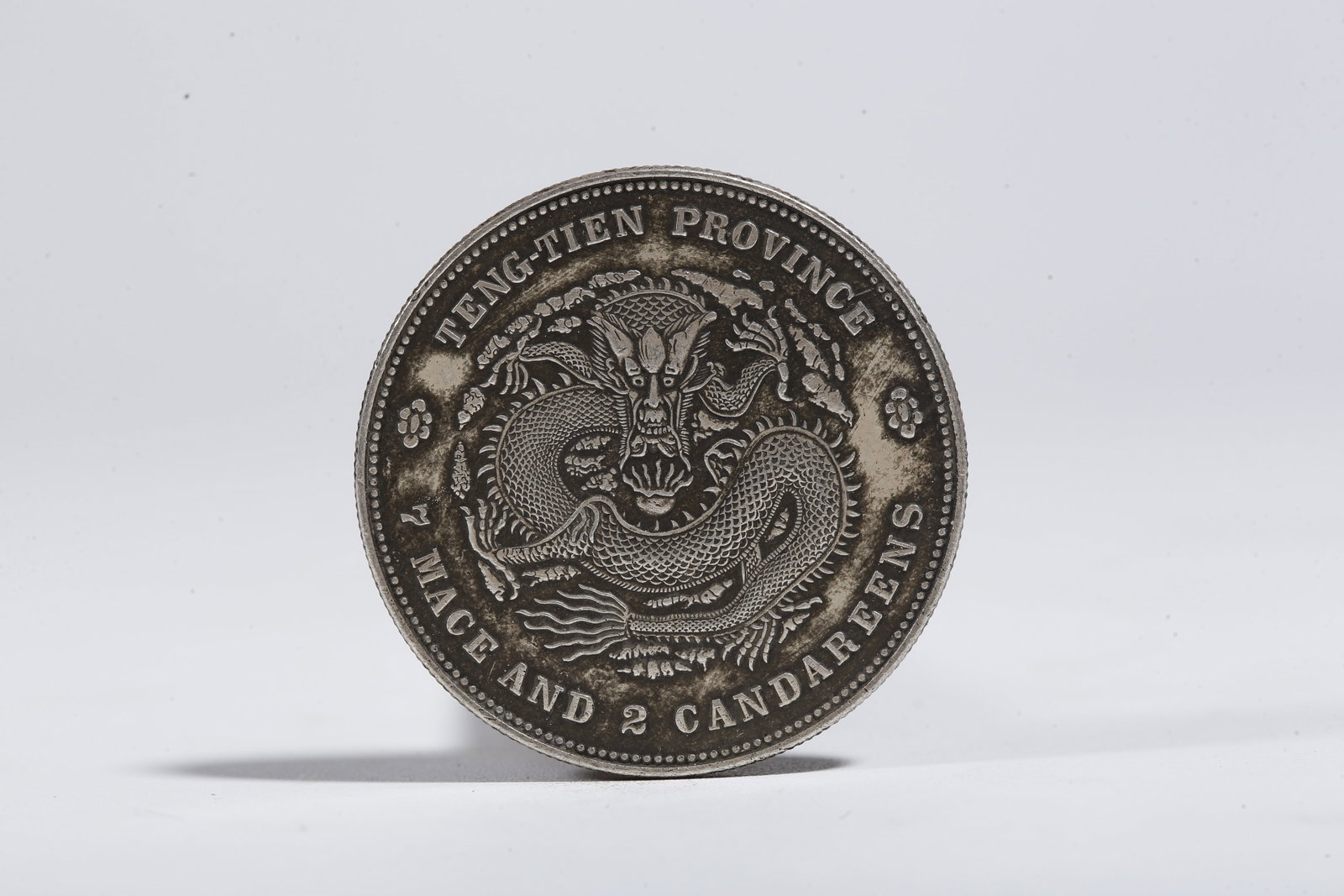 A SILVER DOLLAR COIN - 3