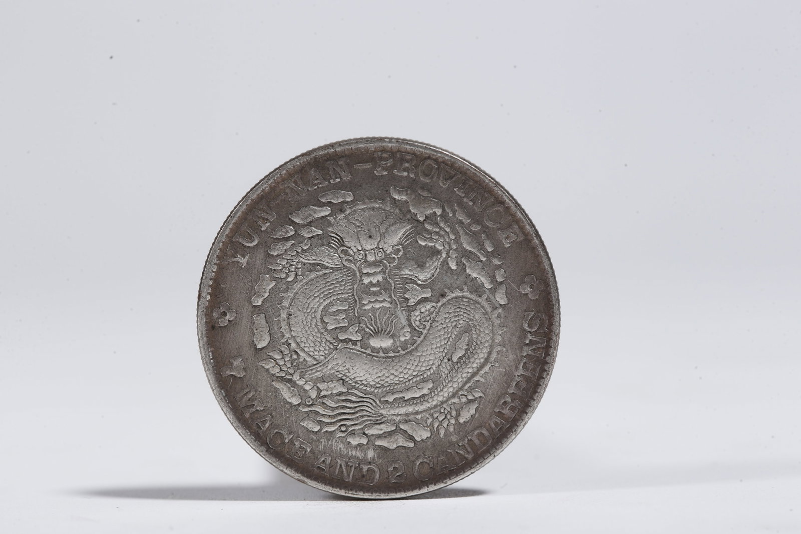A SILVER DOLLAR COIN - 3