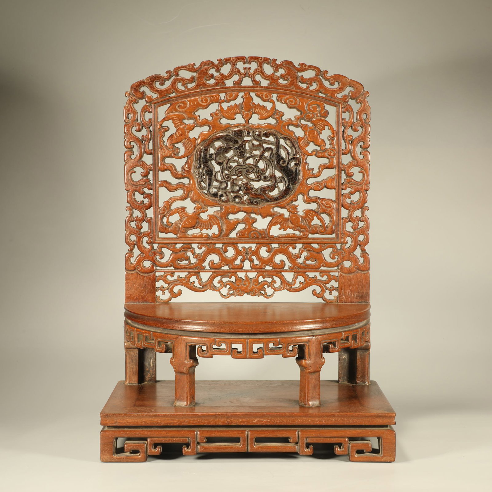 A HUANGHUALI WOOD OPENWORK NICHE WITH BLESSING MOTIFS, INLAID WITH ZITAN DRAGON-CARVED BASE: Huanghuali Wood Openwork Niche with Blessing Motifs, Inlaid with Zitan Dragon-carved Base