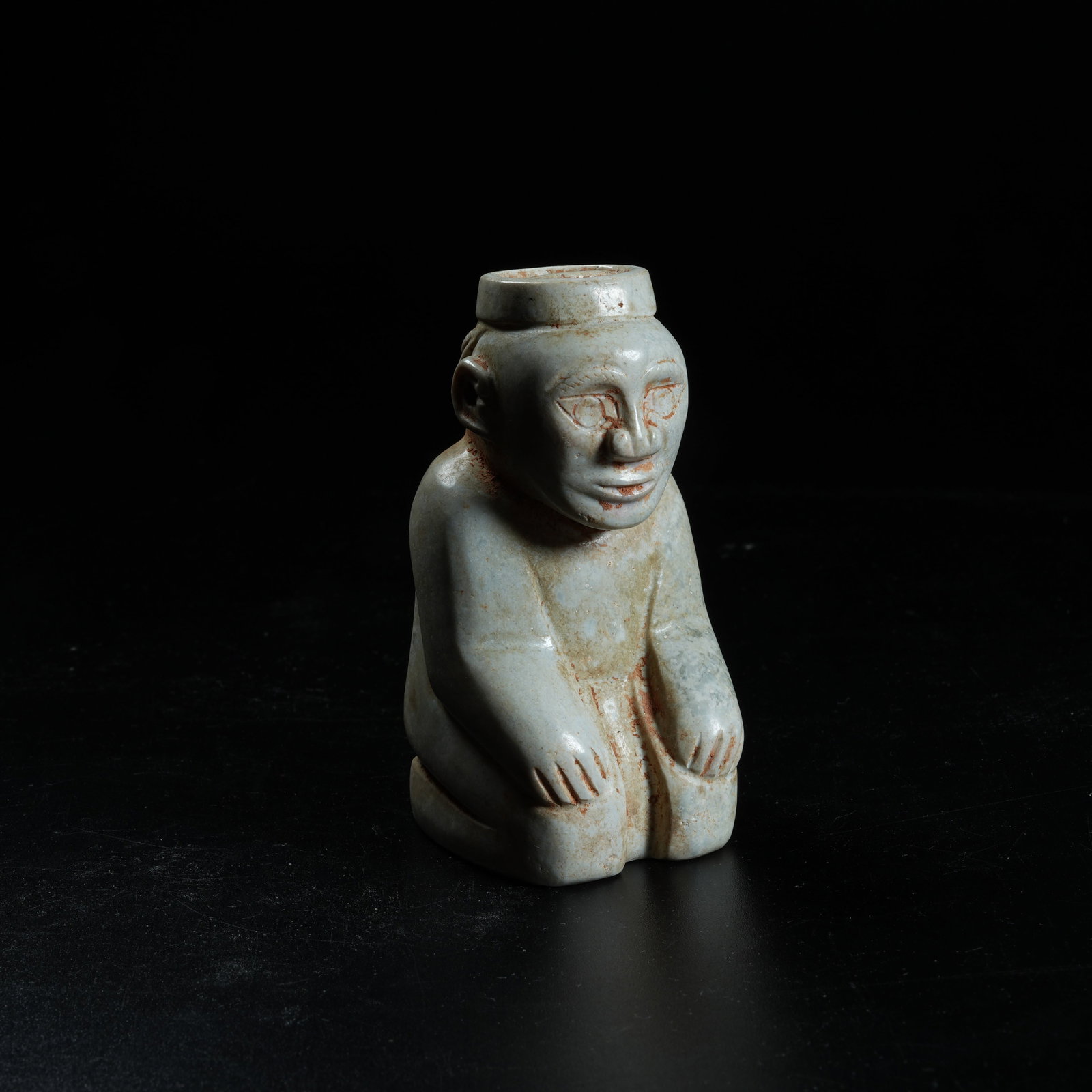 A ARCHAIC JADE KNEELING FIGURE (1 of 8)