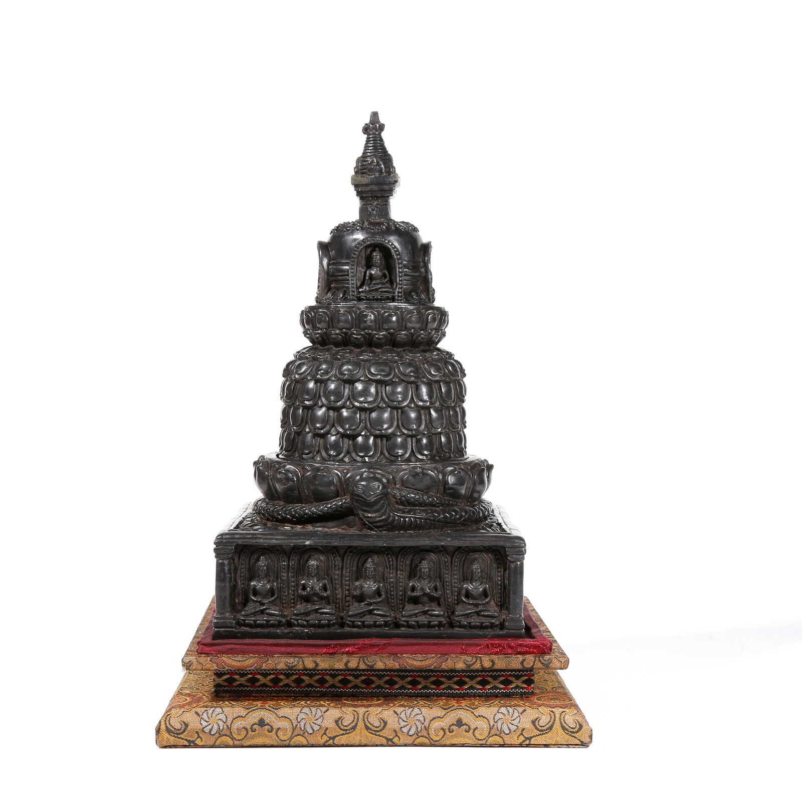 A BLACK STONE BUDDHIST STUPA: Black Stone Buddhist Stupa