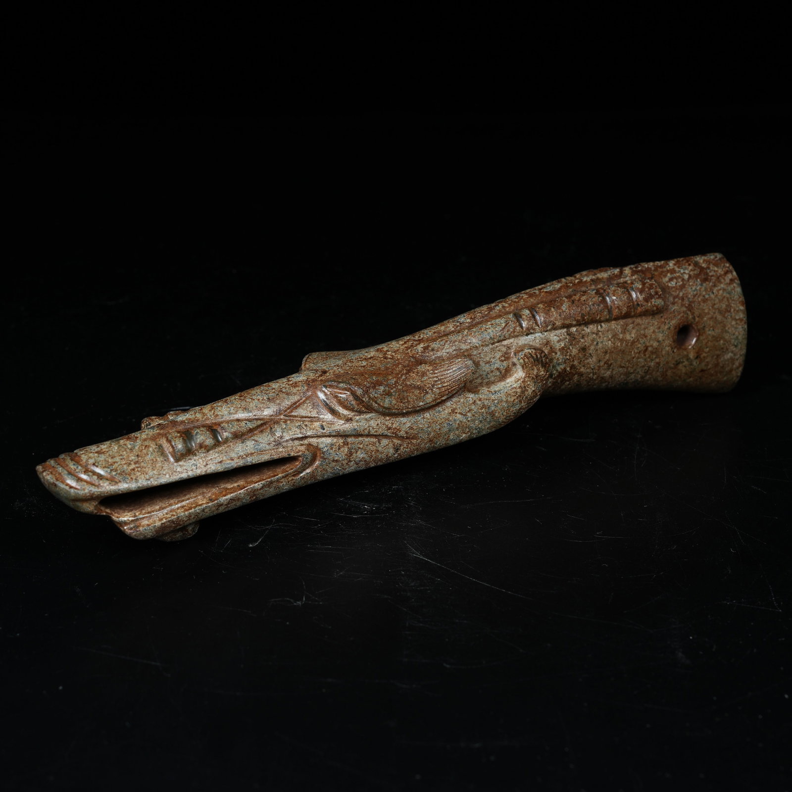 A ARCHAIC JADE BEAST HEAD PENDANT: Archaic Jade Beast Head Pendant