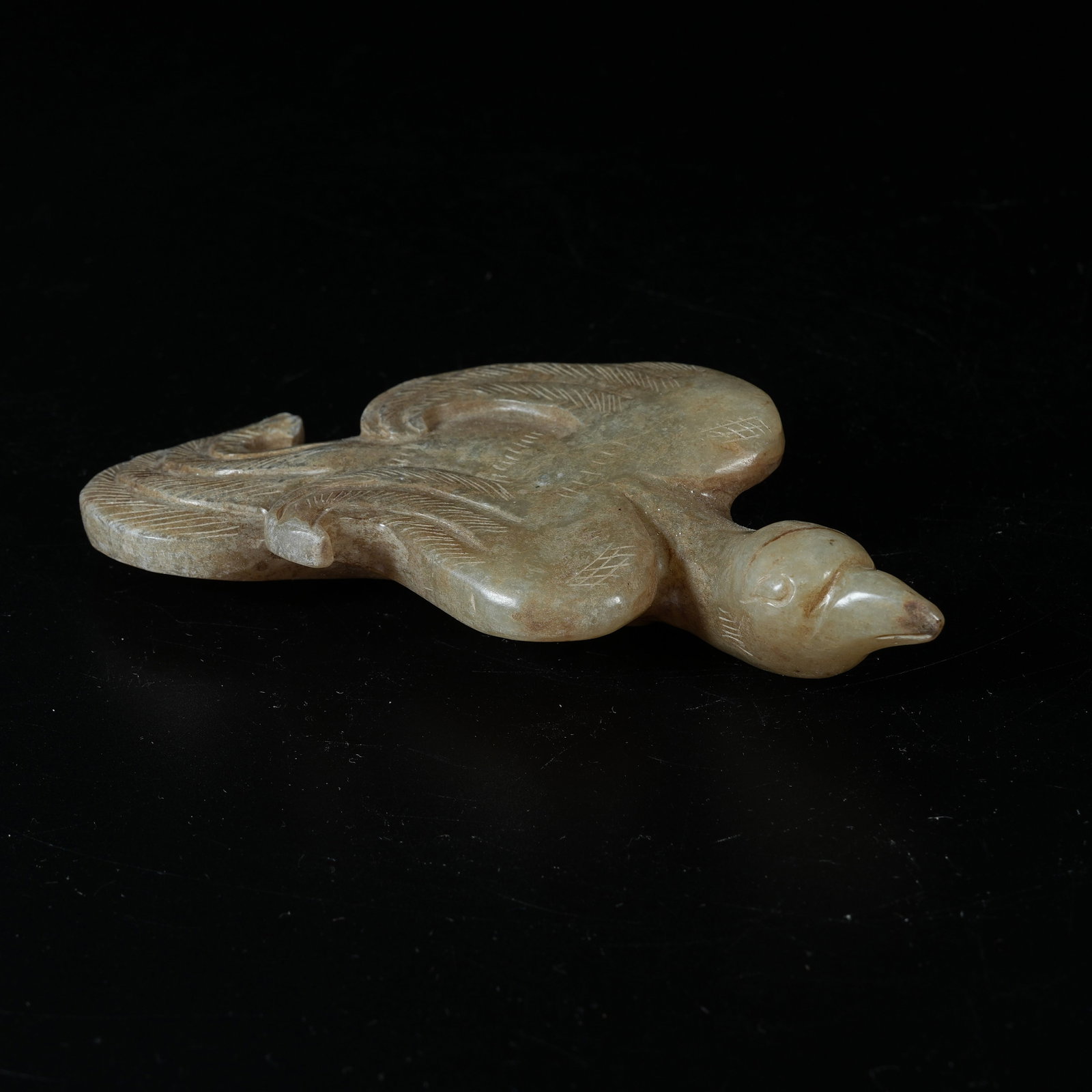 A ARCHAIC JADE PHOENIX ORNAMENT (1 of 7)