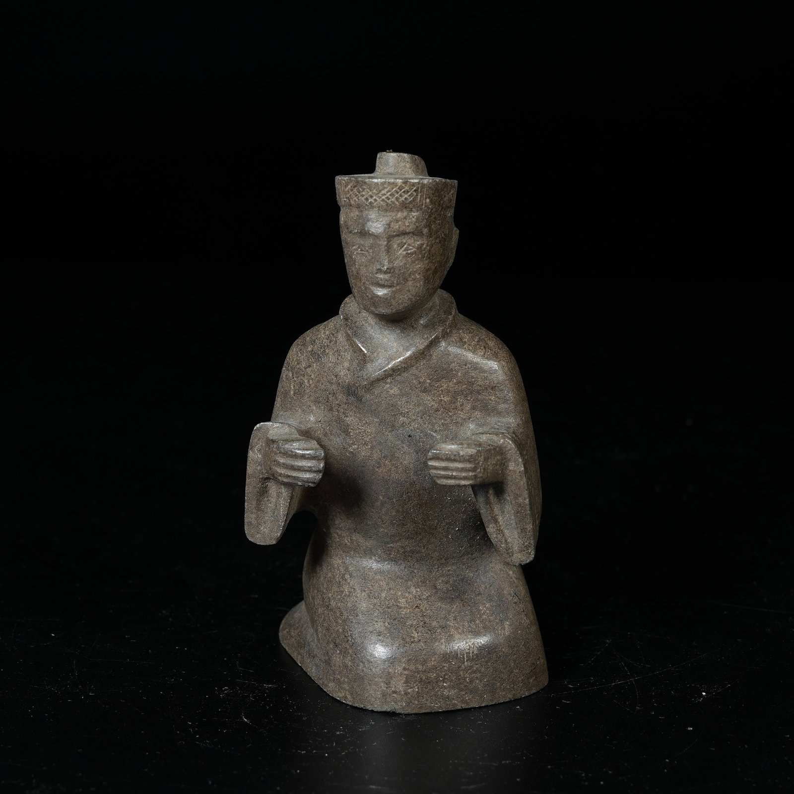 A ARCHAIC JADE KNEELING FIGURINE: Archaic Jade Kneeling Figurine