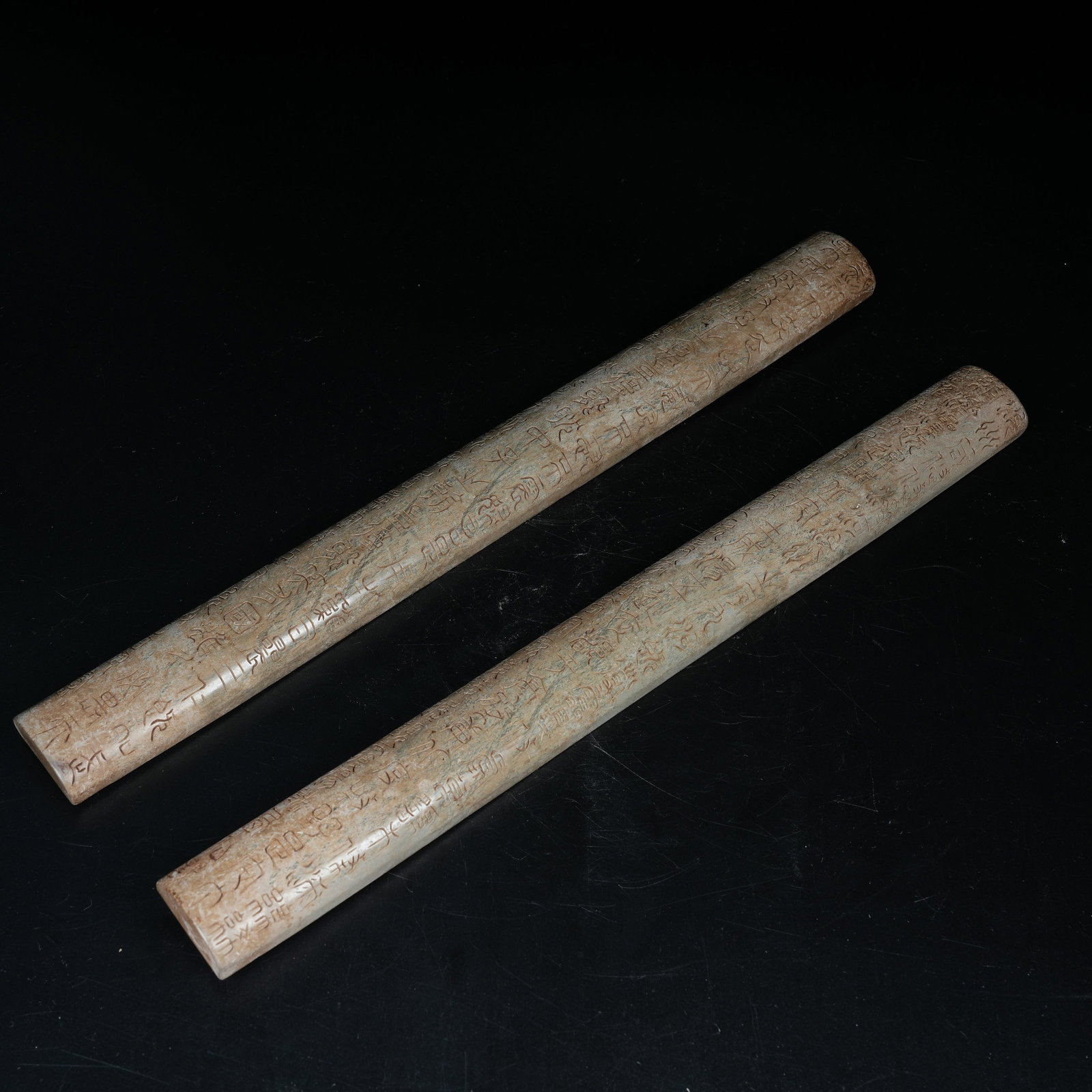 A SET OF ARCHAIC JADE PAPERWEIGHTS CARVED WITH INSCRIPTIONS (1 of 8)