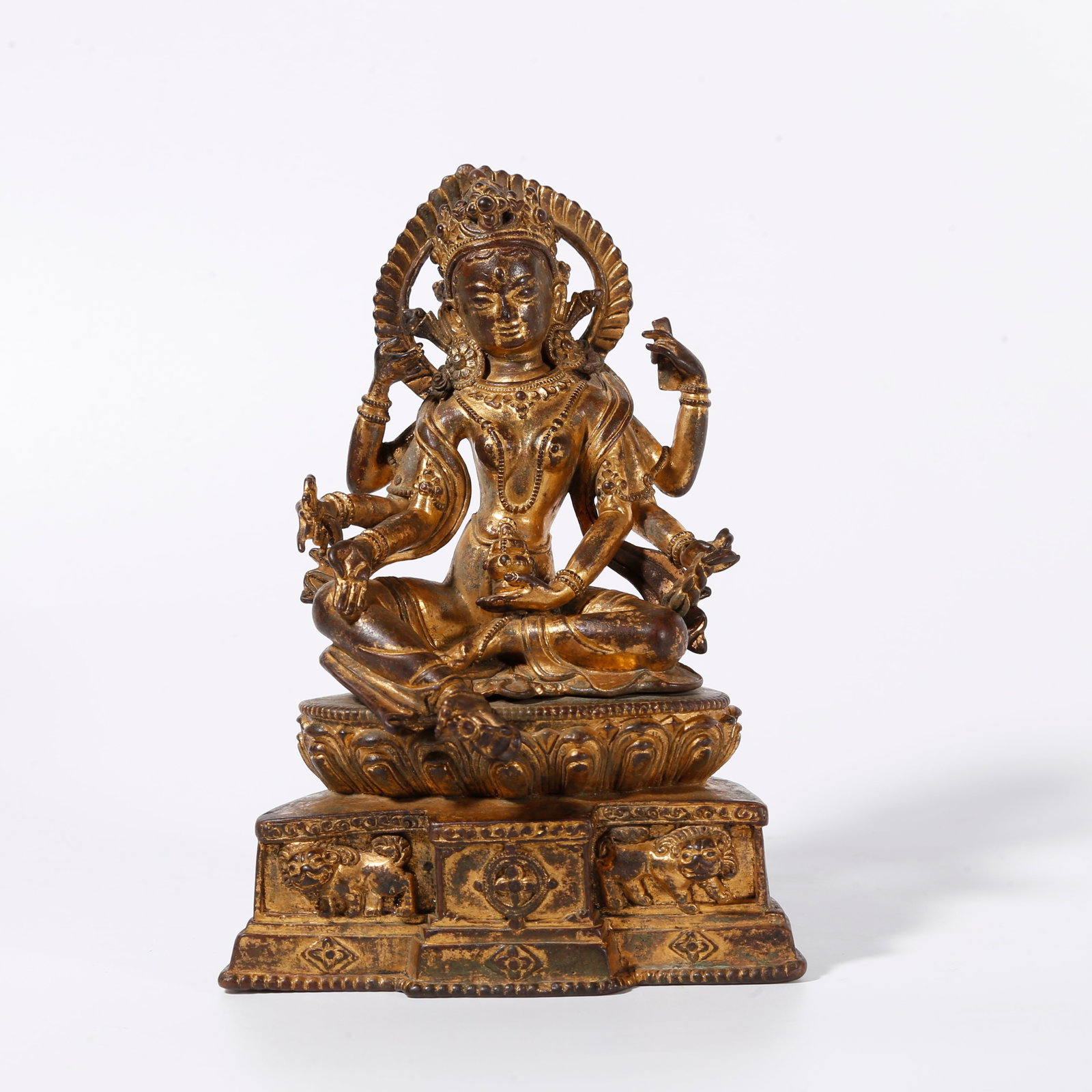 A GILT BRONZE STATUE OF VASUDHARA (1 of 9)