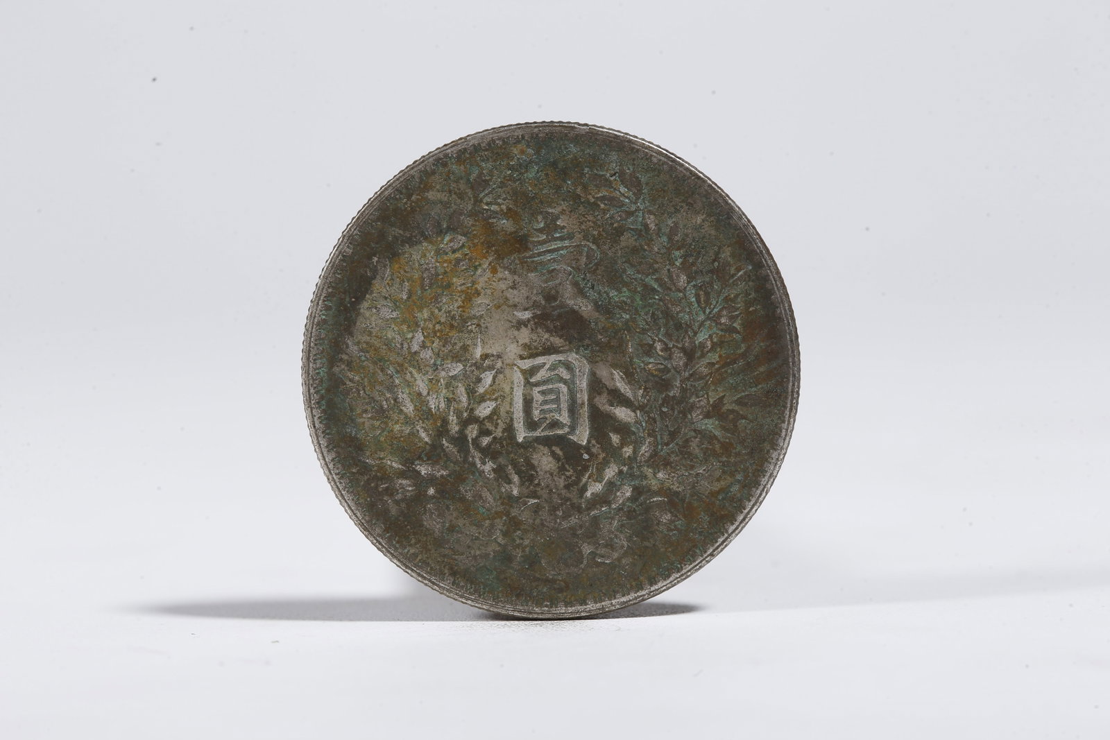 A SILVER DOLLAR COIN - 3