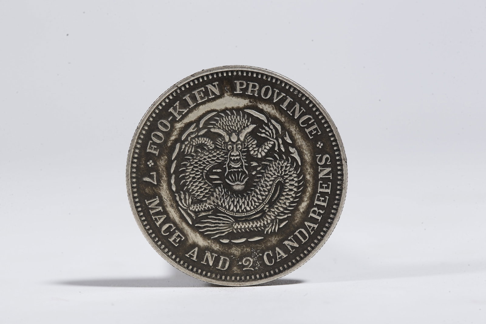 A SILVER DOLLAR COIN - 3