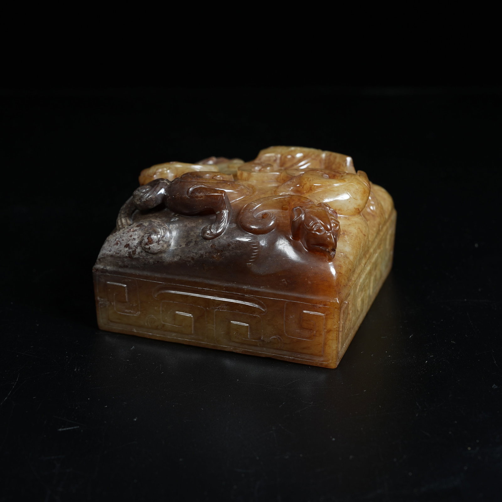 A ARCHAIC JADE SEAL CARVED WITH CHILONG PATTERNS: Archaic Jade Seal Carved with Chilong Patterns