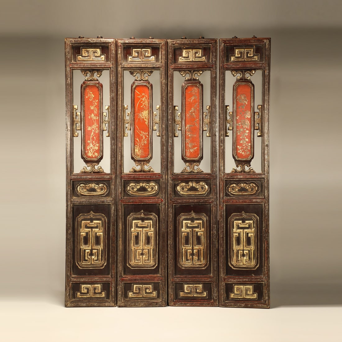 A WOOD-BODY LACQUER GILDED HANGING SCREEN WITH PLUM, ORCHID, BAMBOO AND CHRYSANTHEMUM: Wood-body Lacquer Gilded Hanging Screen with Plum, Orchid, Bamboo and Chrysanthemum