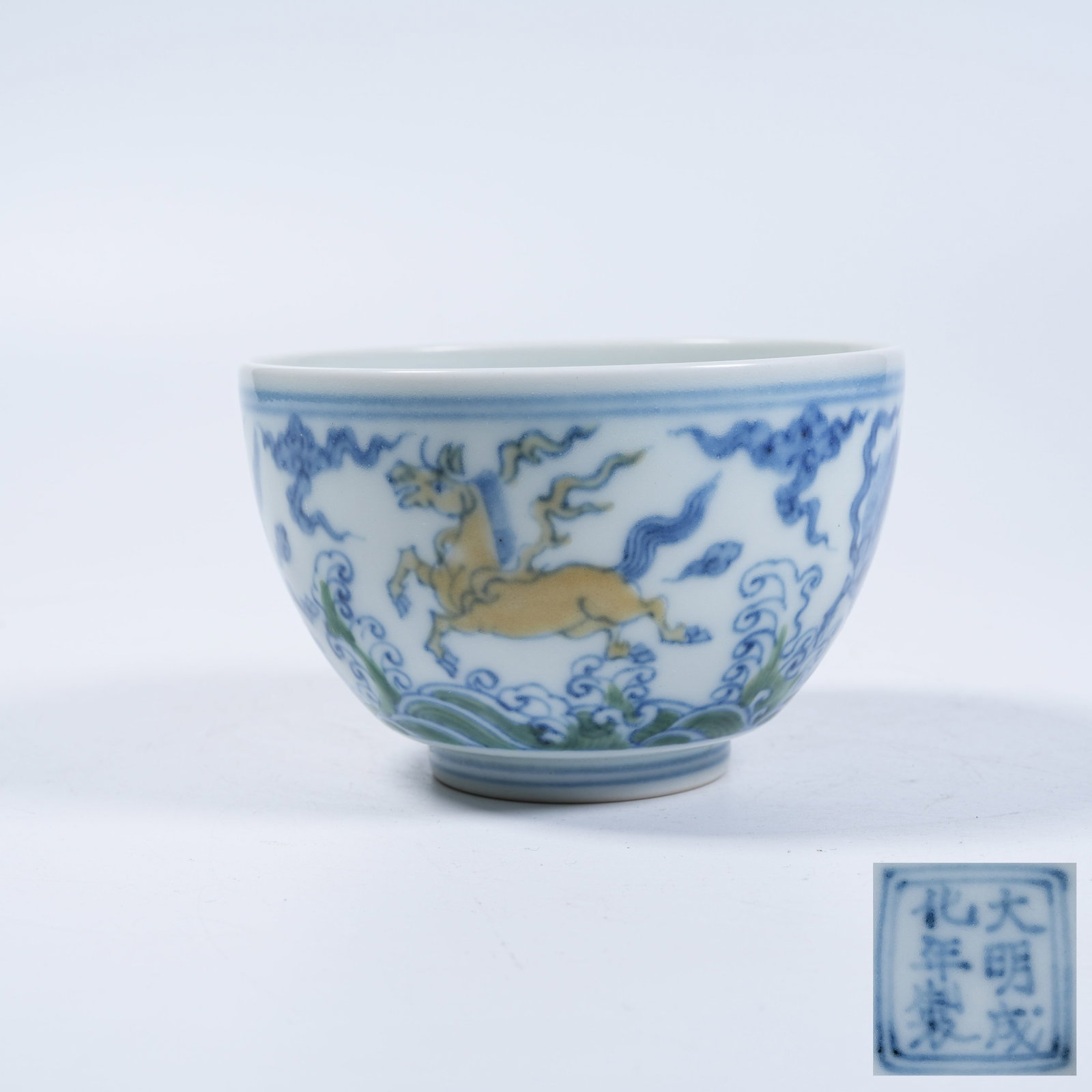 A CUP WITH DOUCAI HEAVENLY HORSE MOTIFS (1 of 9)