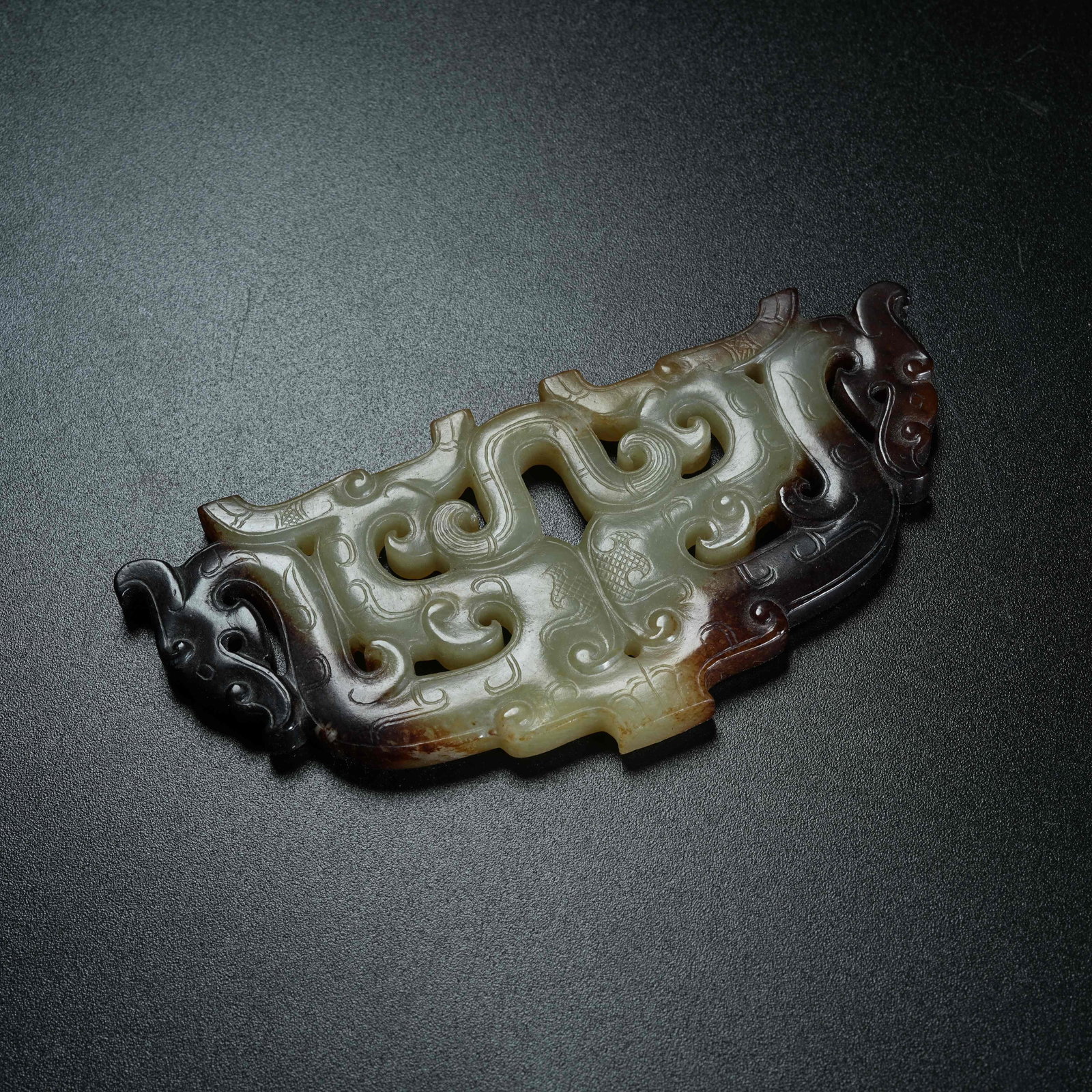 A ARCHAIC JADE S-SHAPED DRAGON ORNAMENT: Archaic Jade S-shaped Dragon Ornament