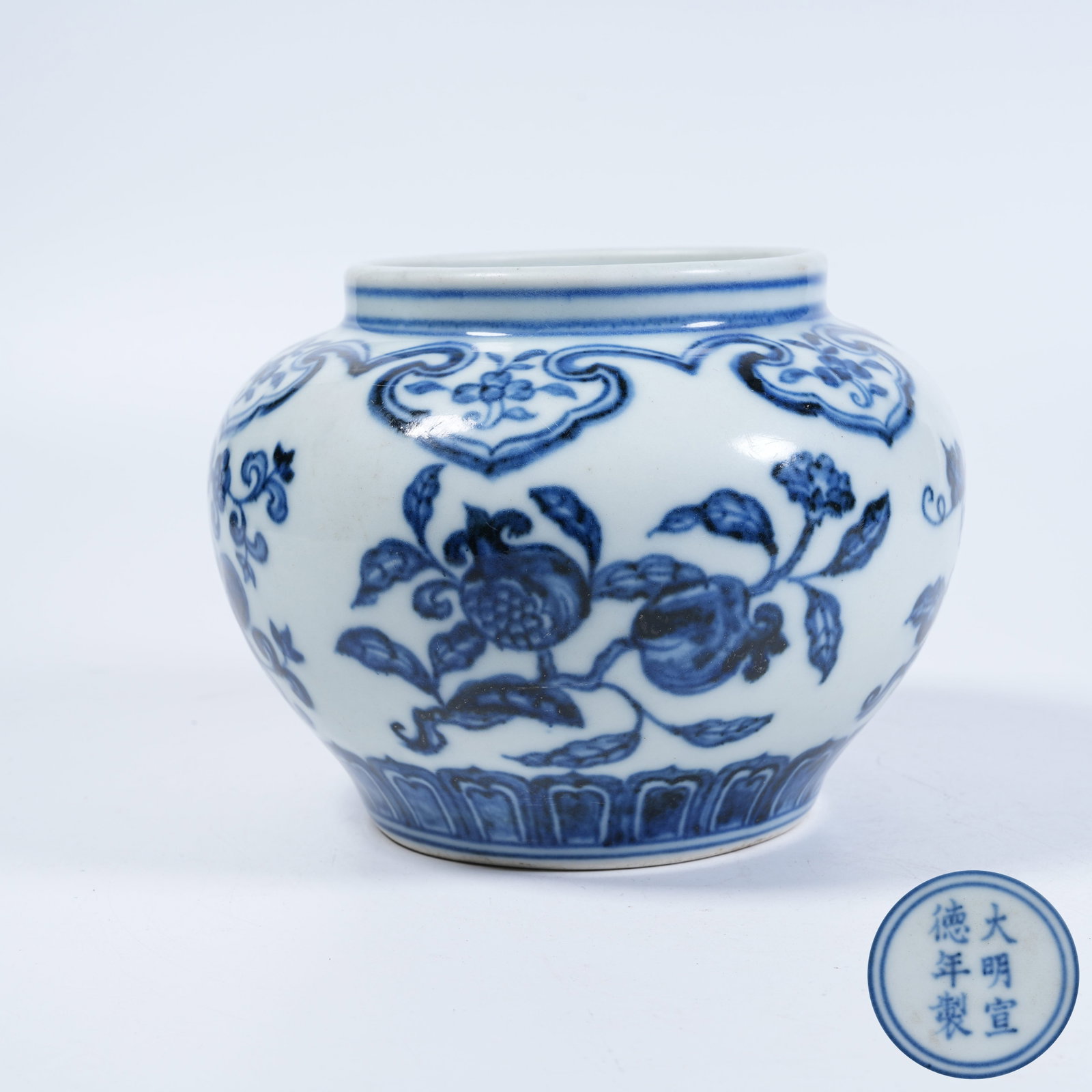 A JAR WITH BLUE AND WHITE THREE AUSPICIOUS FRUITS PATTERNS: Jar with Blue and White Three Auspicious Fruits Patterns