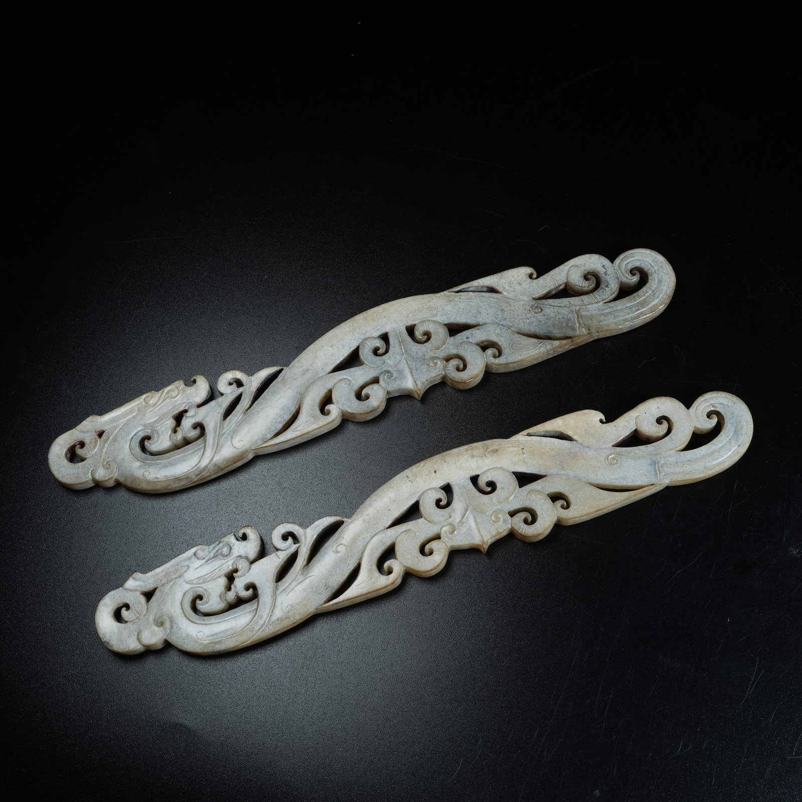 A SET OF ANCIENT JADE PENDANTS CARVED WITH DRAGON PATTERNS: Set of Ancient Jade Pendants Carved with Dragon Patterns