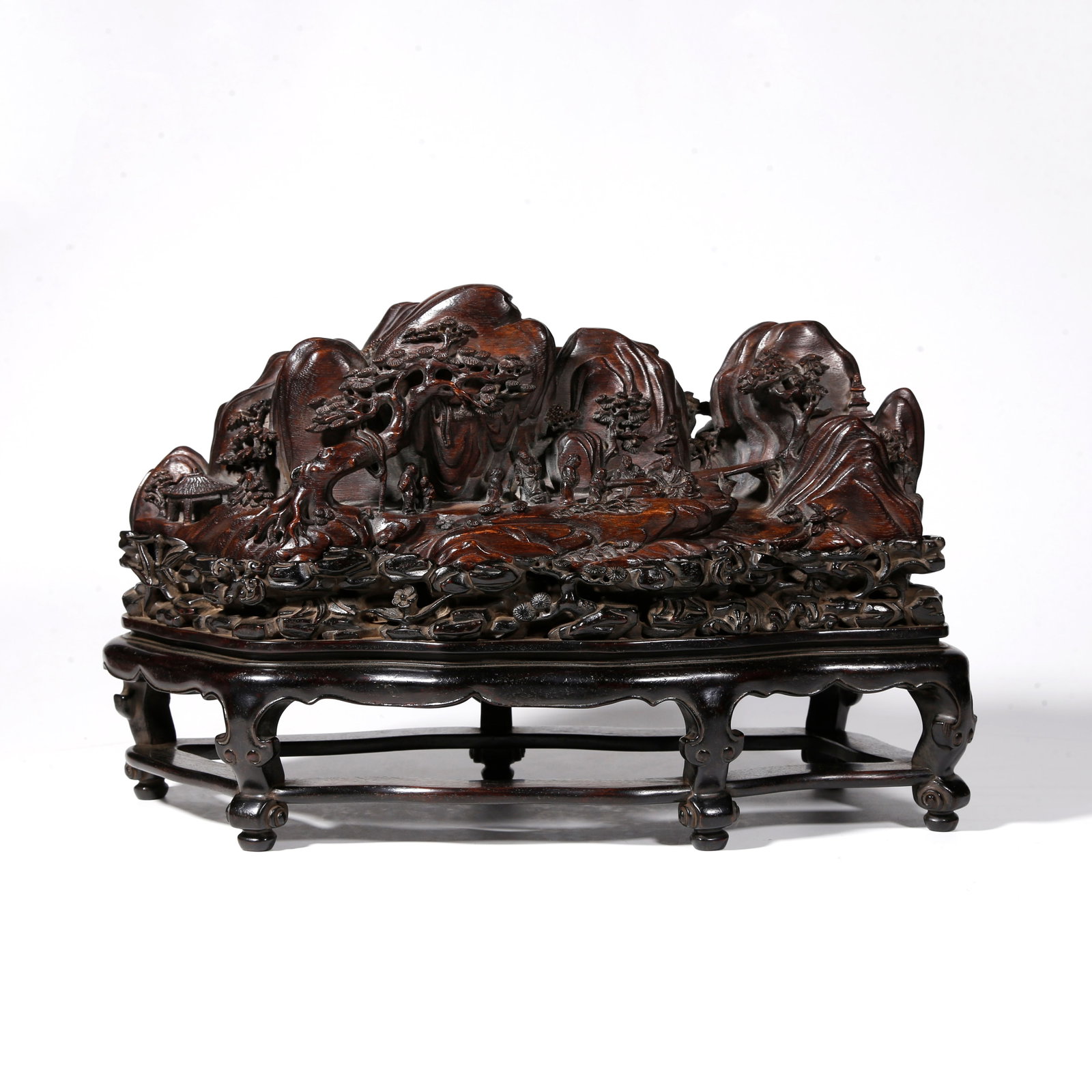 A AGARWOOD CARVED FAN-SHAPED FIGURAL ORNAMENT: Agarwood Carved Fan-Shaped Figural Ornament