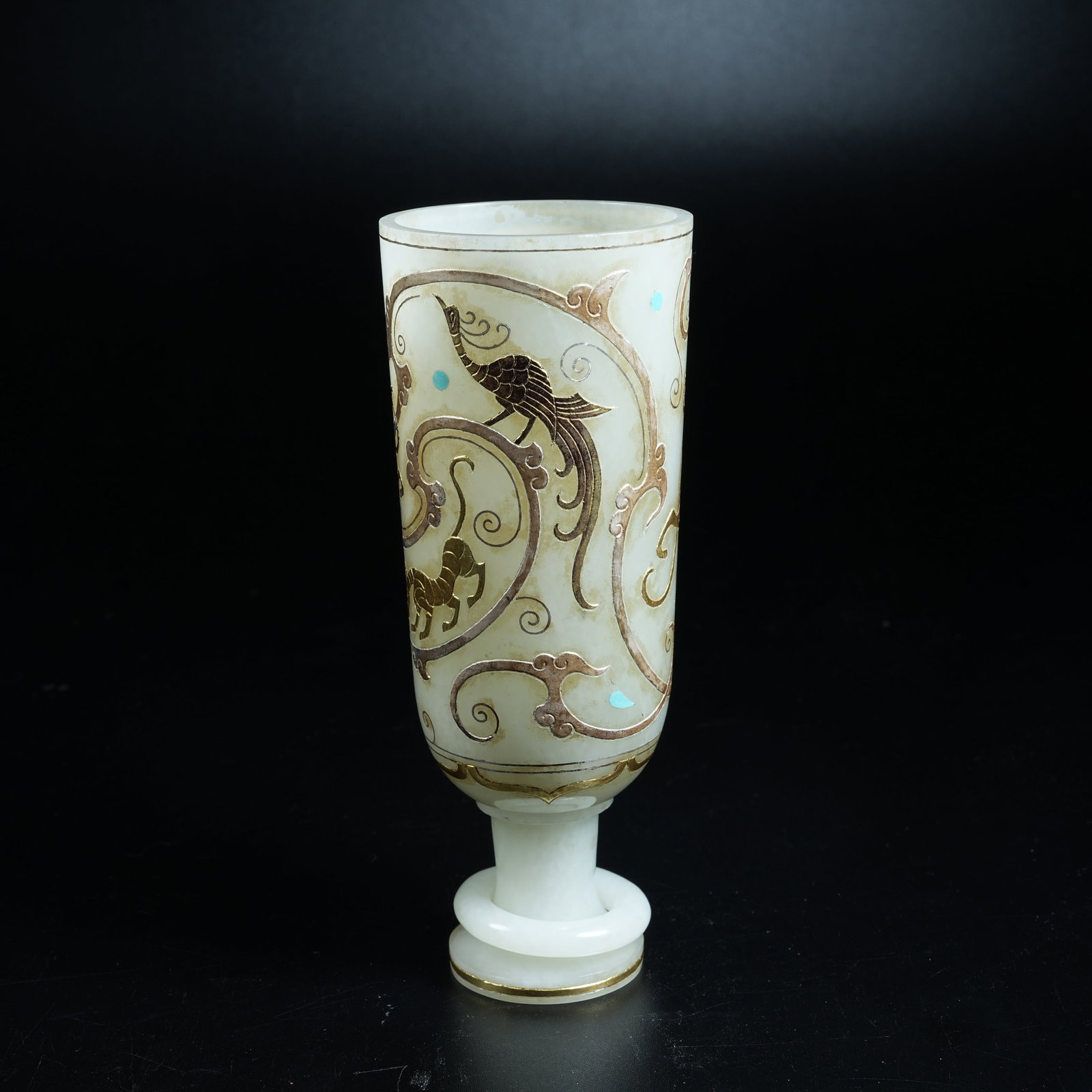 A HETIAN JADE STEM CUP WITH MOVABLE RINGS INLAID WITH GOLD, SILVER AND GEMSTONES: Hetian Jade Stem Cup with Movable Rings Inlaid with Gold, Silver and Gemstones