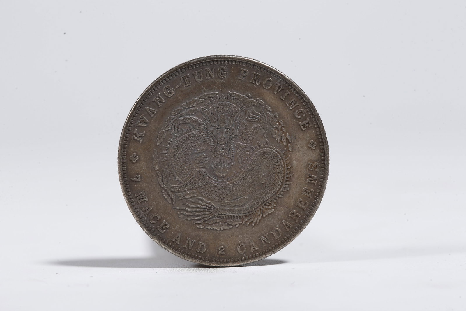 A SILVER DOLLAR COIN - 3