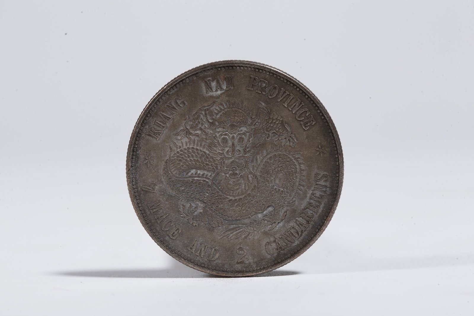 A SILVER DOLLAR COIN - 3