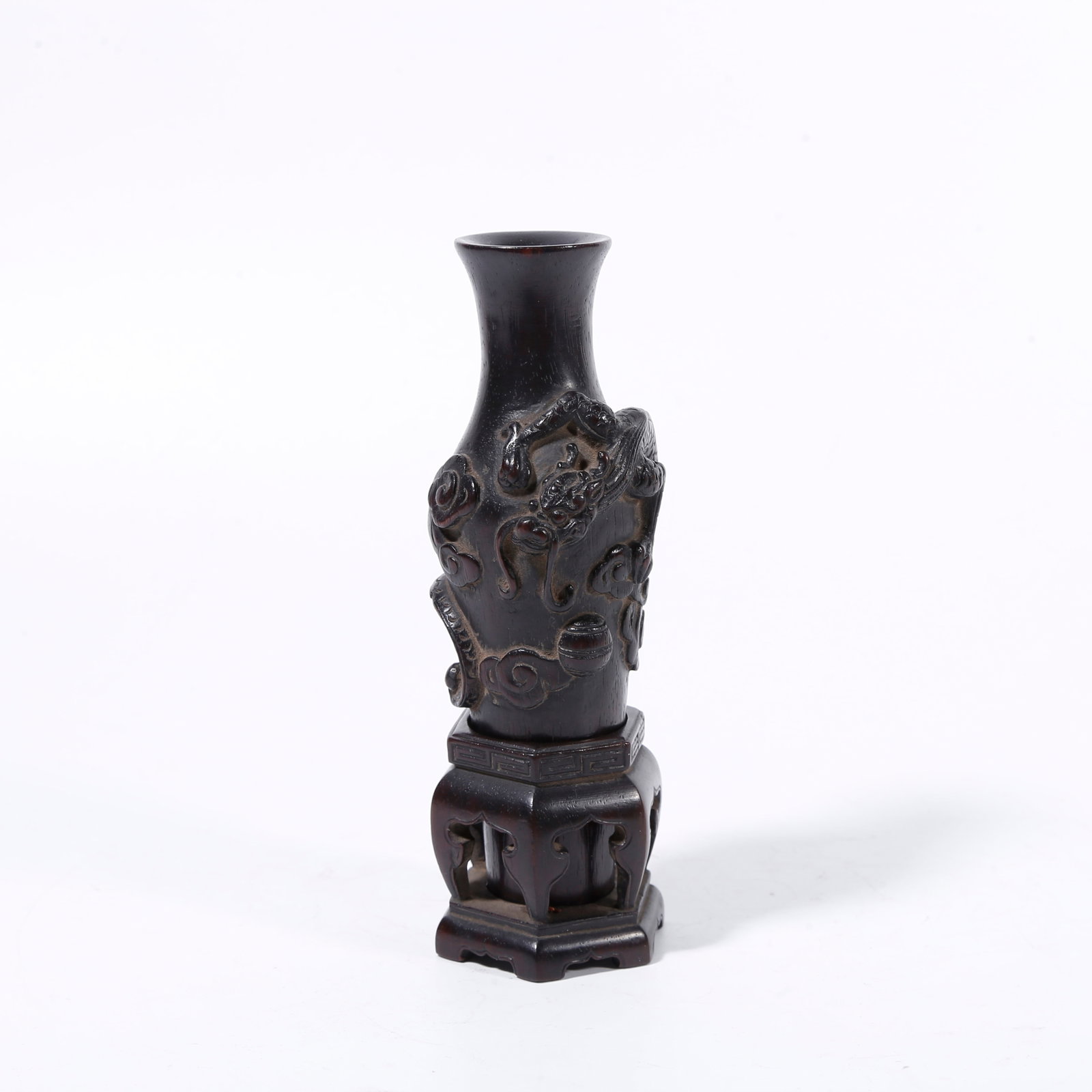A RED SANDALWOOD CARVED CLOUD-DRAGON PATTERN INCENSE HOLDER: Red sandalwood carved cloud-dragon pattern incense holder