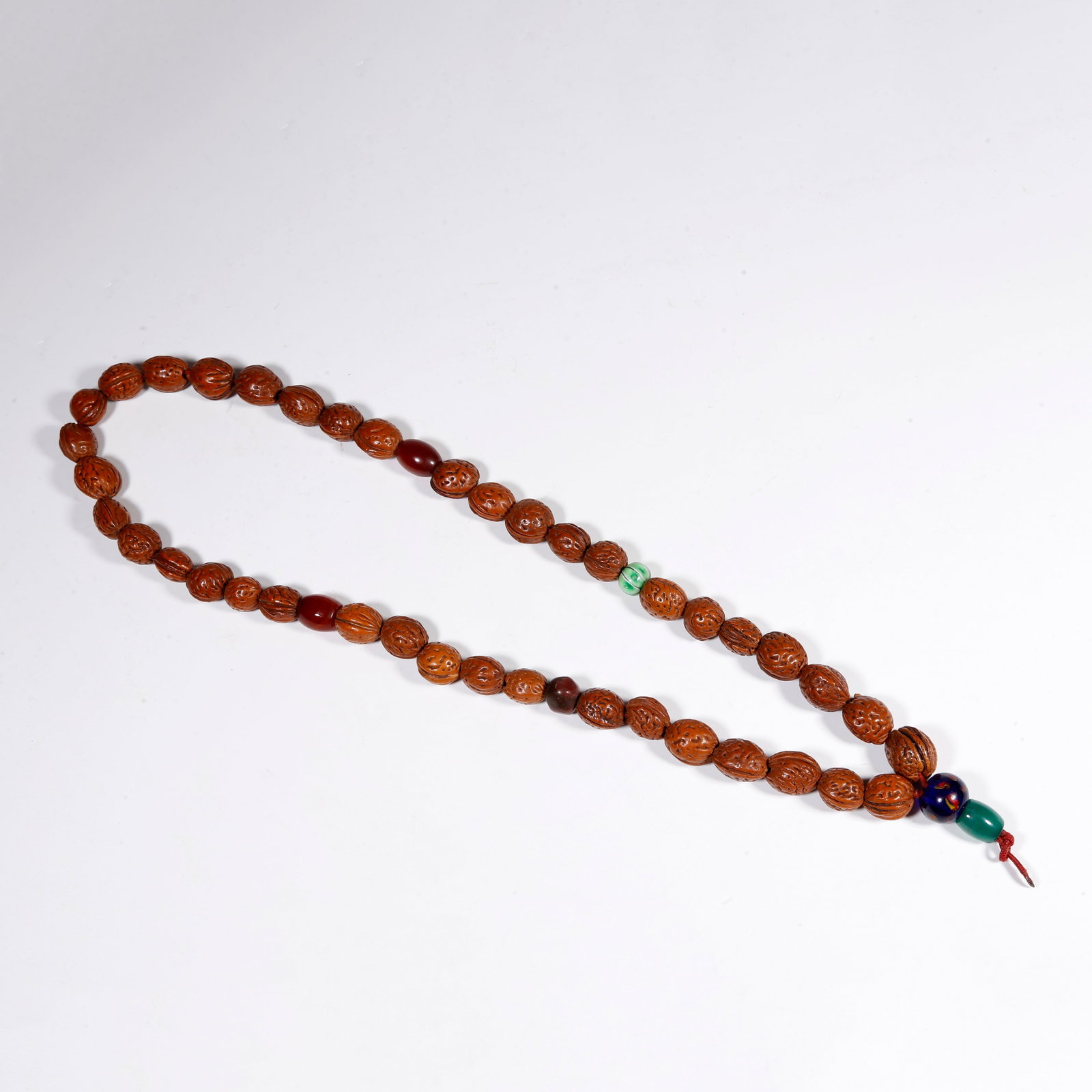 A NUT-KERNEL PENDANT