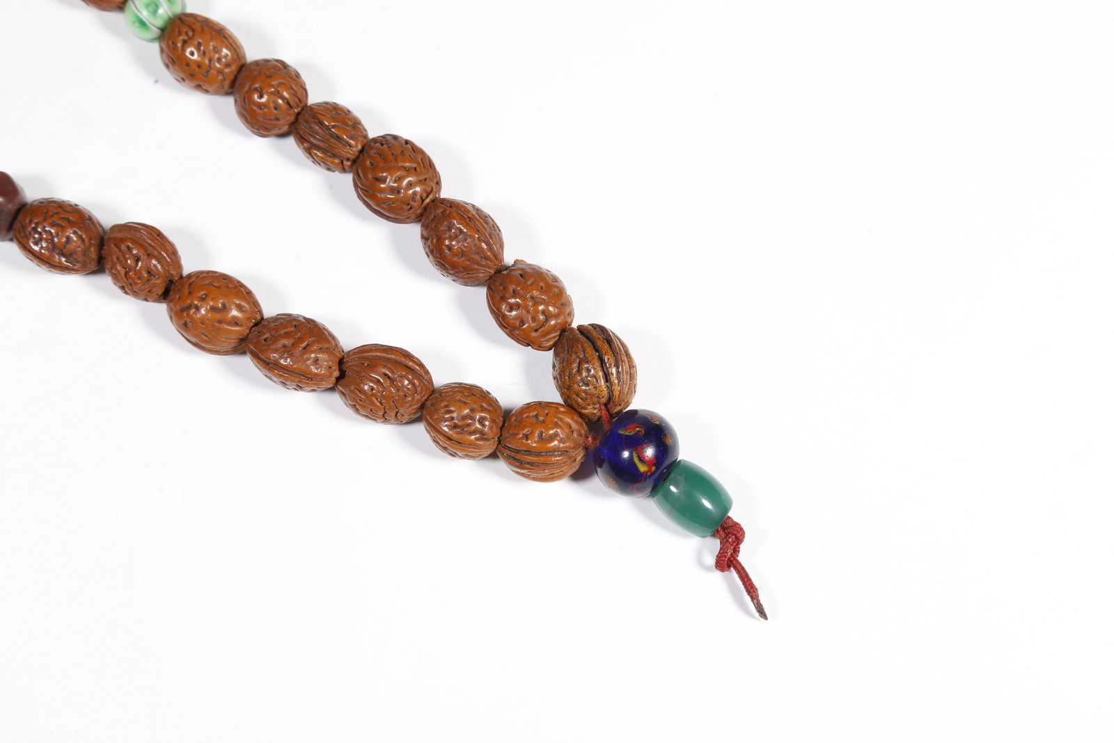 A NUT-KERNEL PENDANT - 2