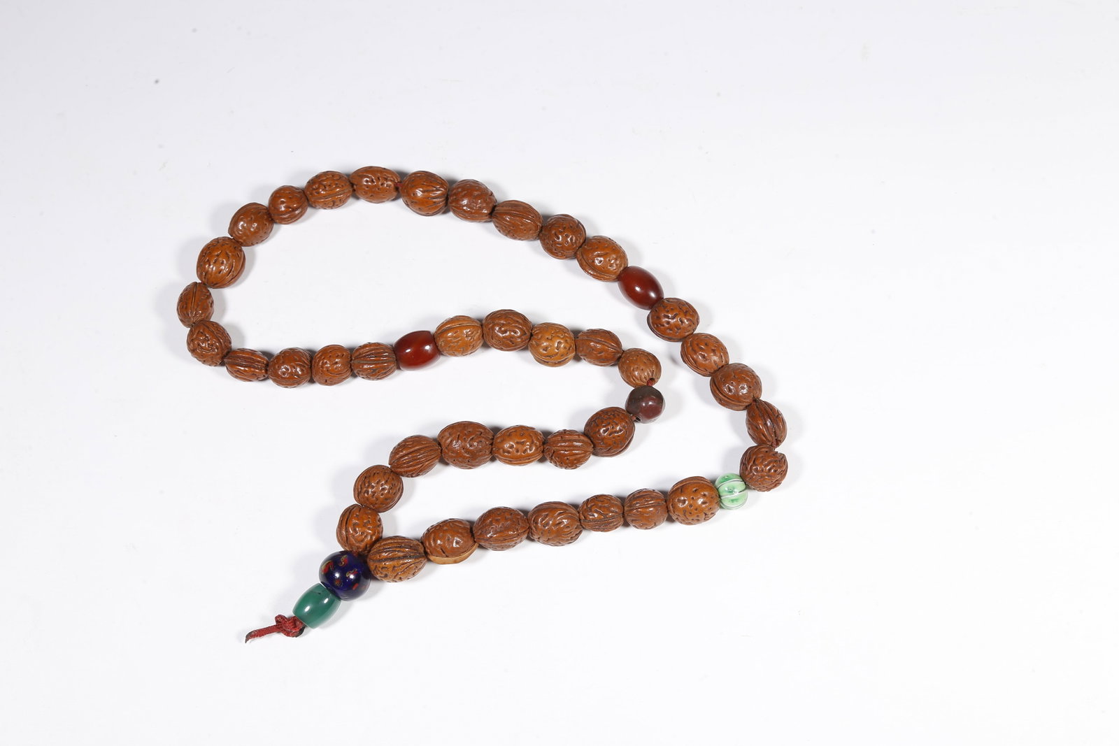 A NUT-KERNEL PENDANT - 5