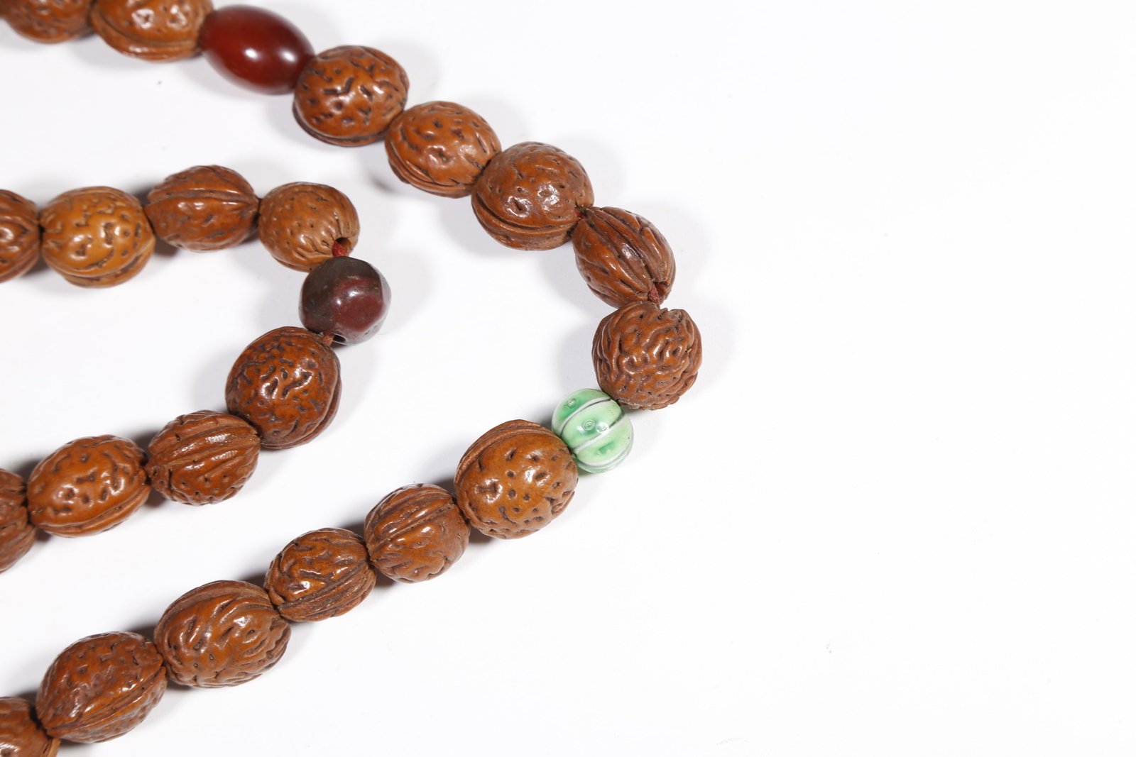 A NUT-KERNEL PENDANT - 6
