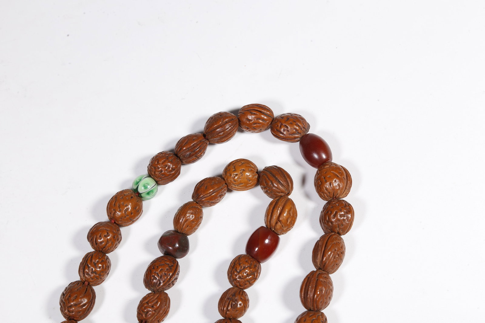 A NUT-KERNEL PENDANT - 8