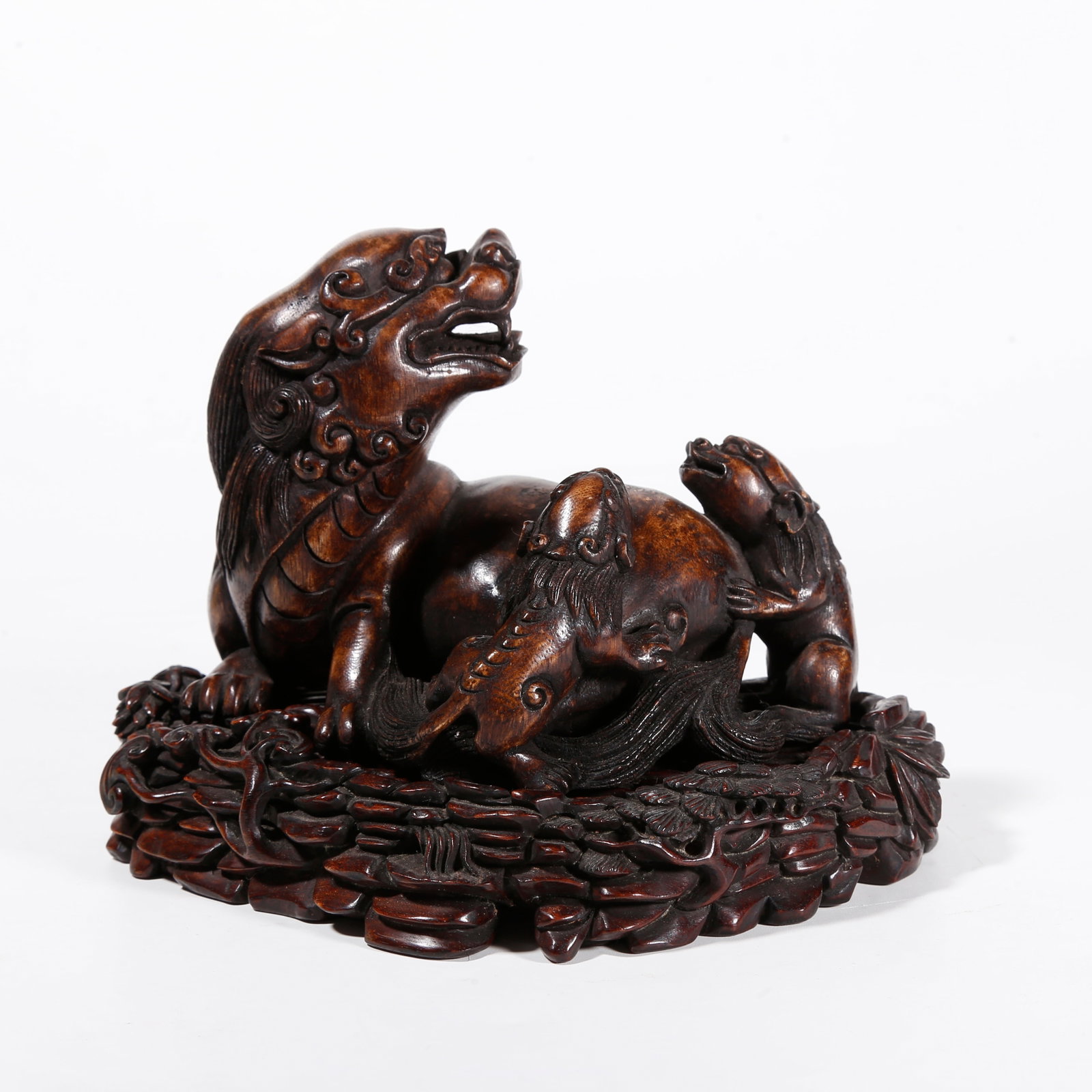 A AGARWOOD CARVED ORNAMENT IN FORM OF LARGE AND SMALL LIONS (1 of 9)