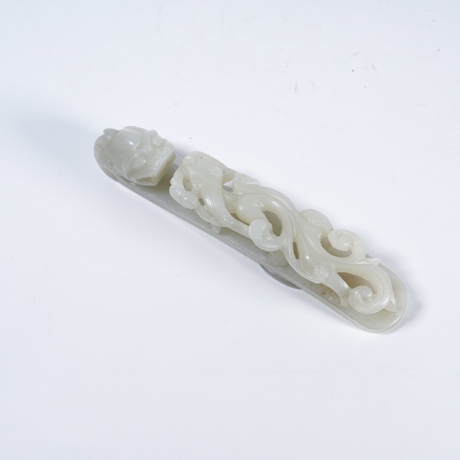 A HETIAN WHITE JADE BELT HOOK WITH DRAGON PATTERN (1 of 7)
