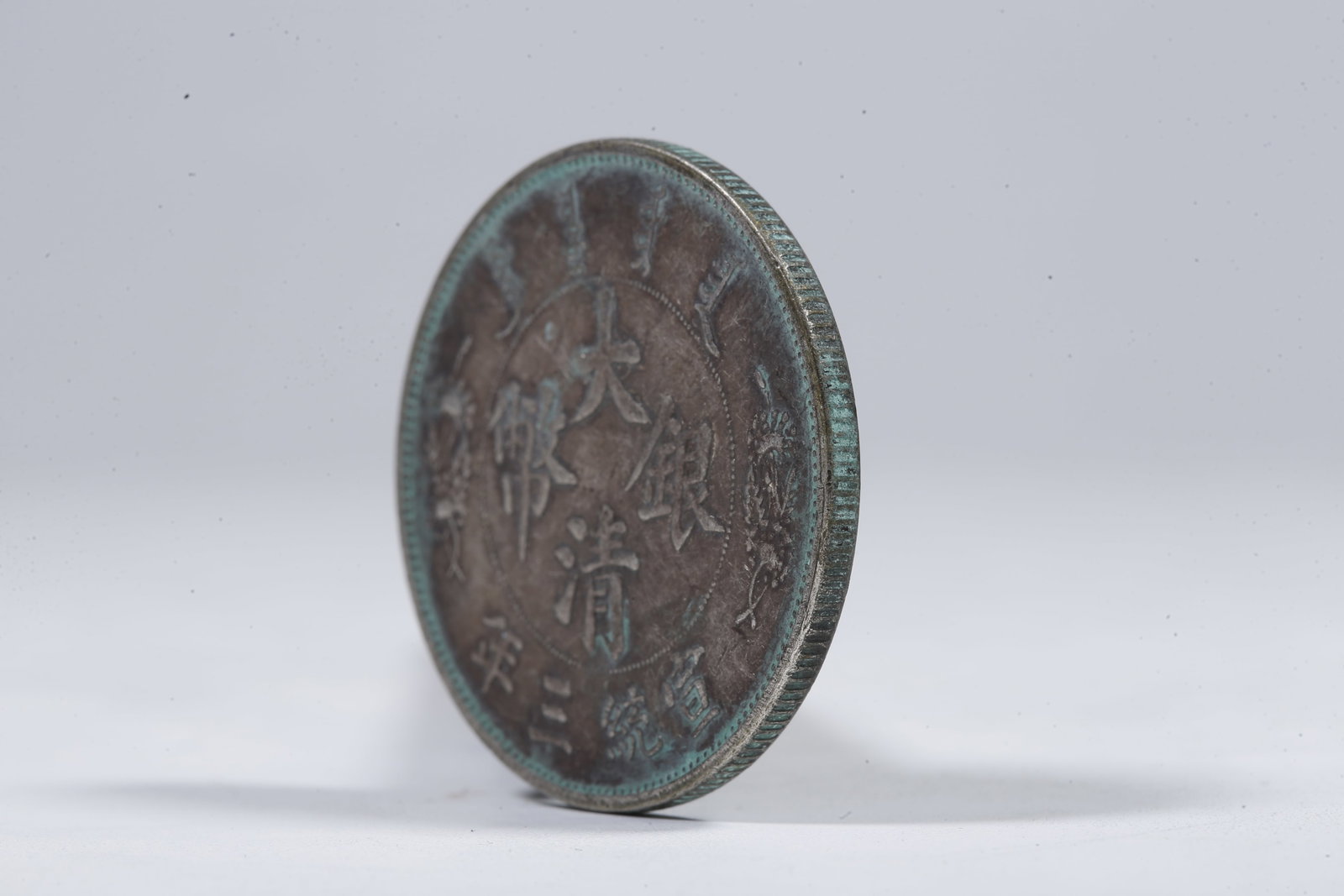 A SILVER DOLLAR COIN - 2