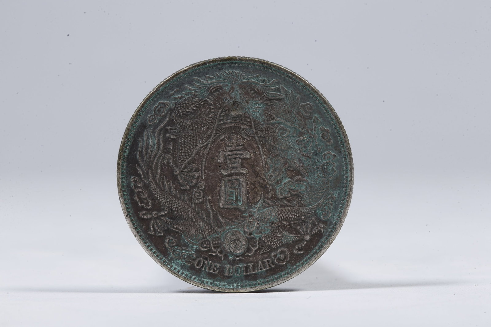 A SILVER DOLLAR COIN - 3